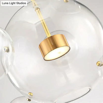 Modern brass bubble cluster pendant light – dining room clear glass