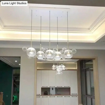 Modern brass bubble cluster pendant light – dining room clear glass
