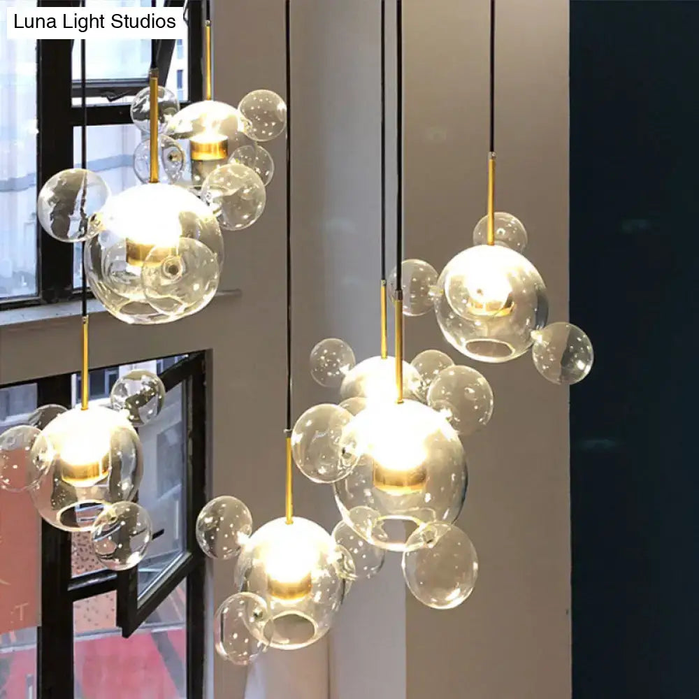 Modern brass bubble cluster pendant light – dining room clear glass