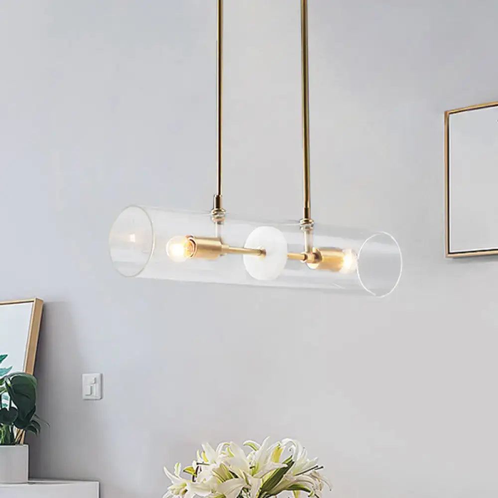 Modern brass finish island pendant with clear glass kitchen light