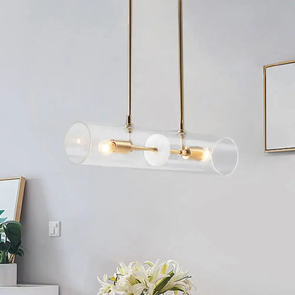 Modern brass finish island pendant with clear glass kitchen light