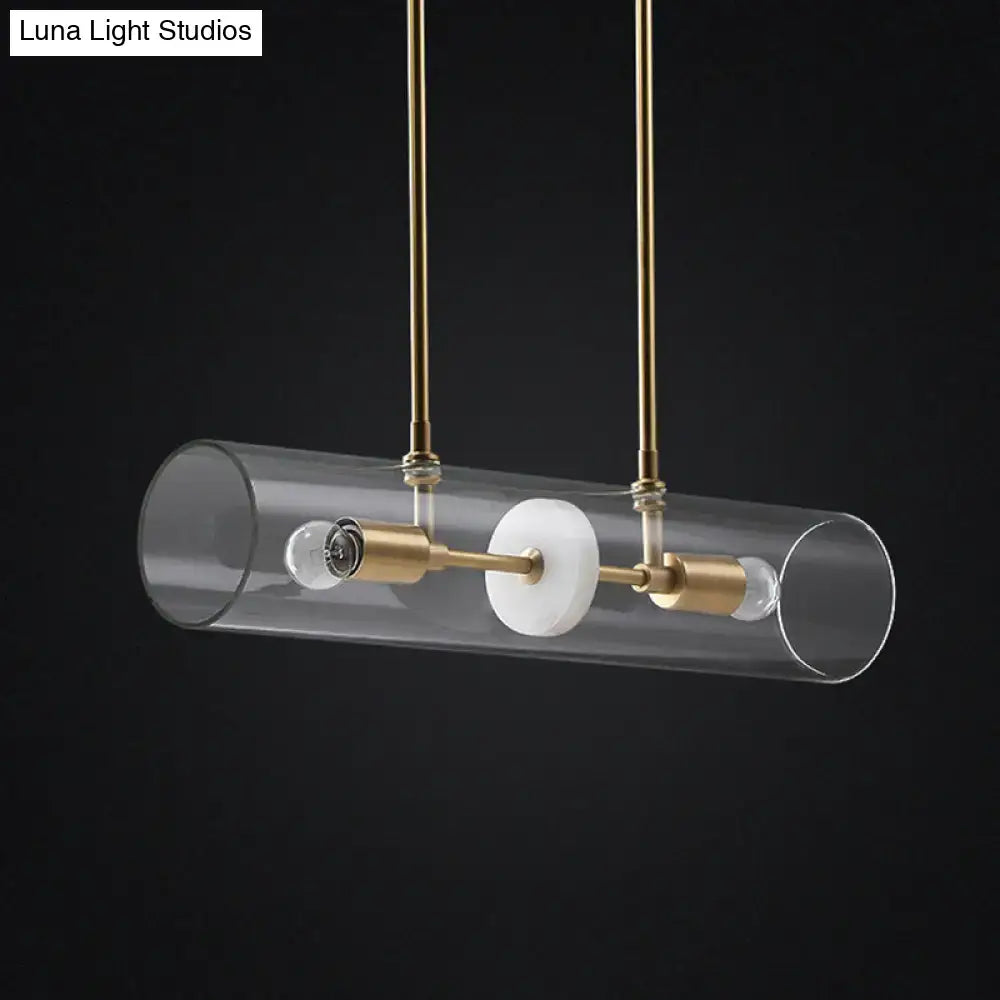 Modern brass finish island pendant with clear glass kitchen light