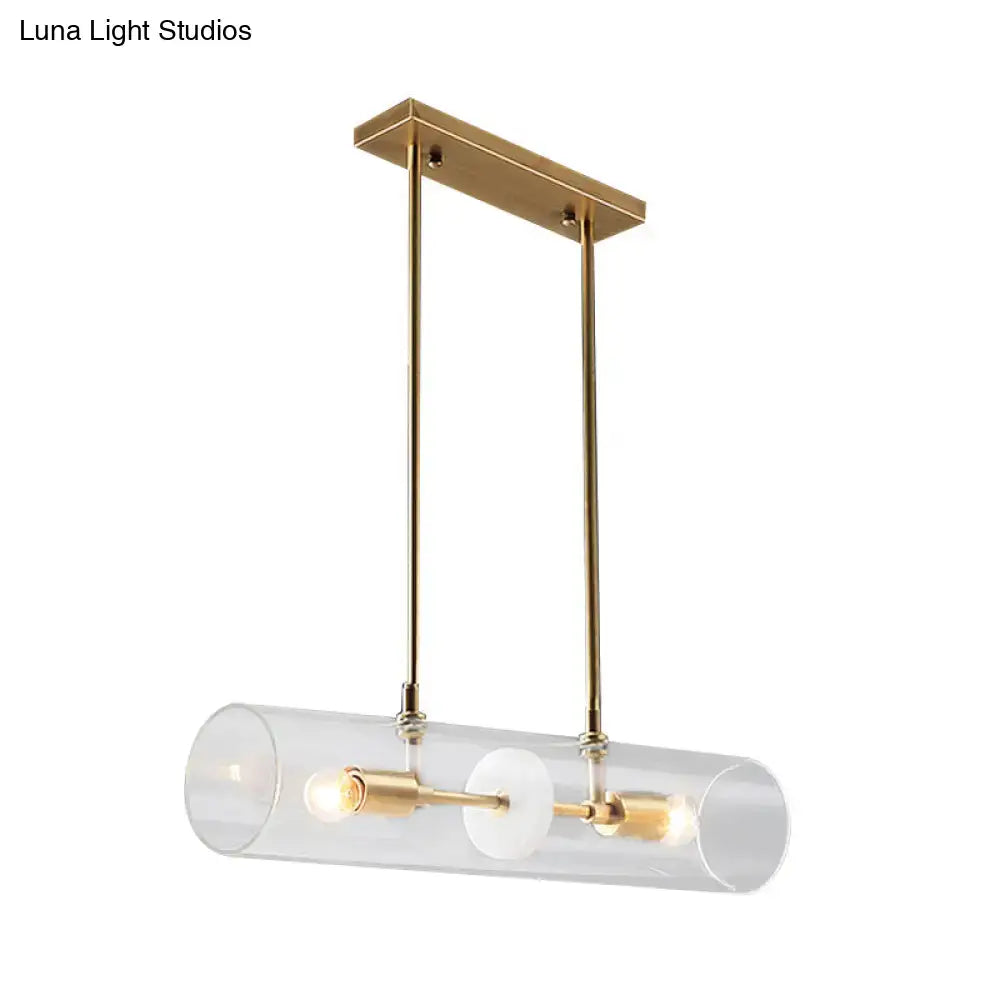 Modern brass finish island pendant with clear glass kitchen light