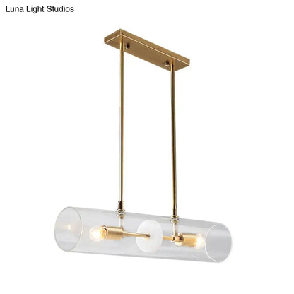 Modern brass finish island pendant with clear glass kitchen light