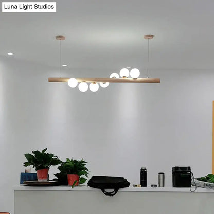Modern cream and wood ball island pendant light dining room