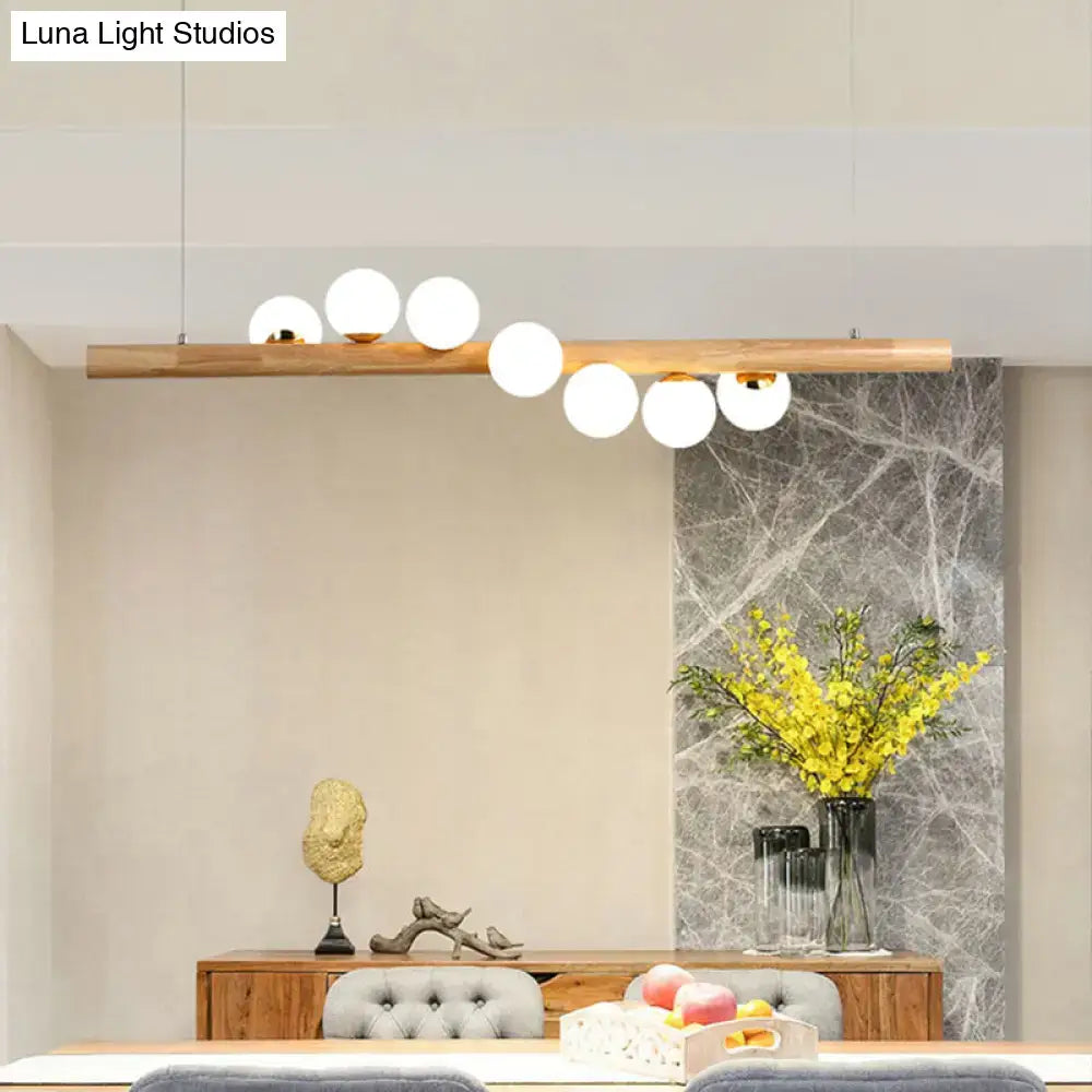 Modern cream and wood ball island pendant light dining room