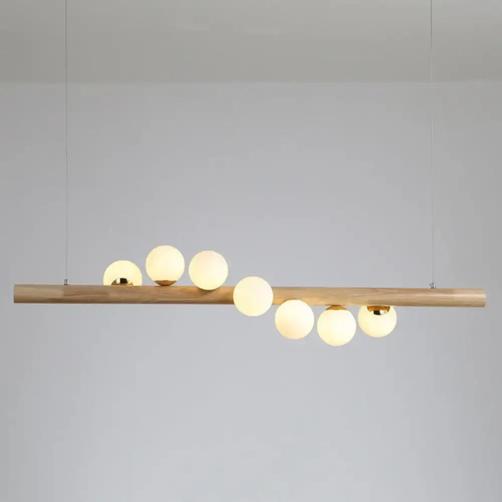 Modern cream and wood ball island pendant light dining room