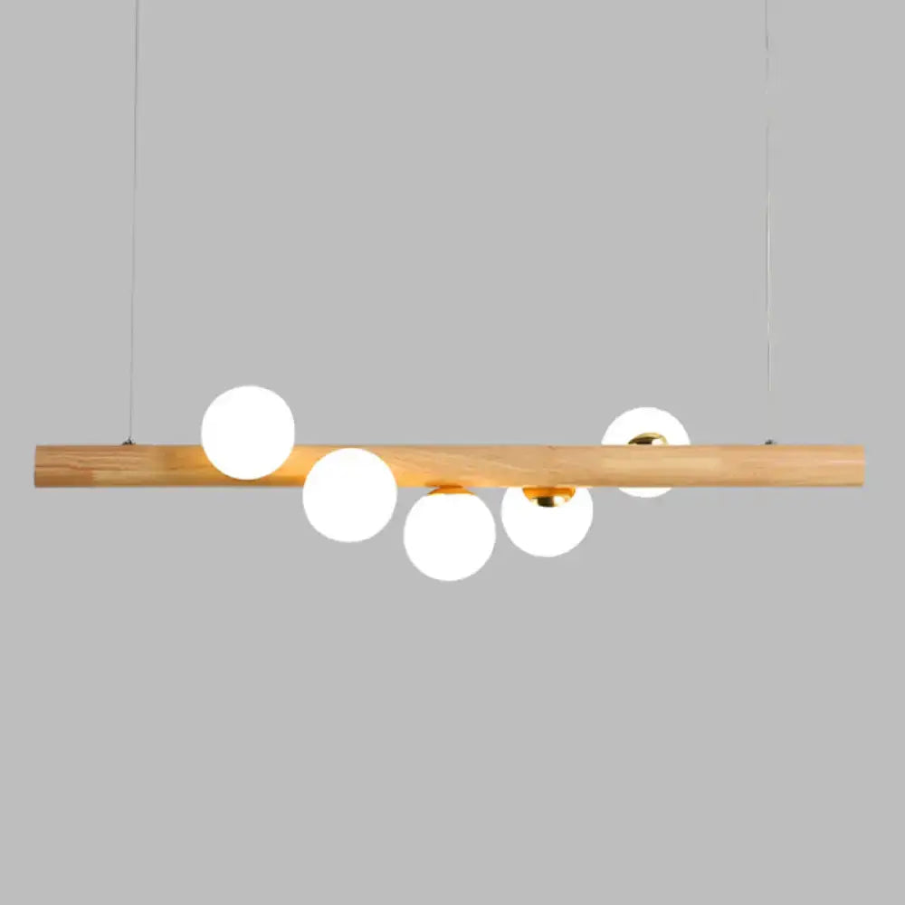 Modern cream and wood ball island pendant light dining room