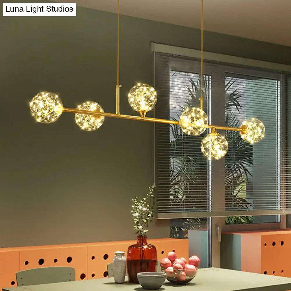 Minimalist brass led fairy light clear glass sphere dining room pendant