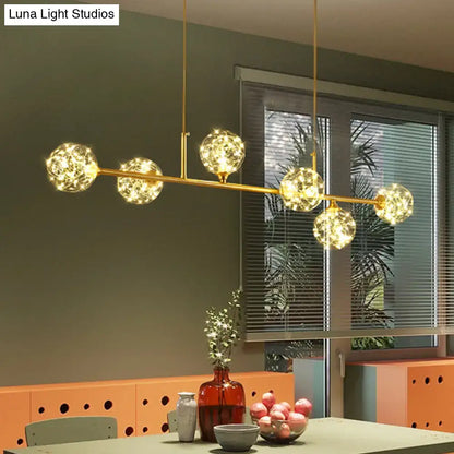 Minimalist brass led fairy light clear glass sphere dining room pendant