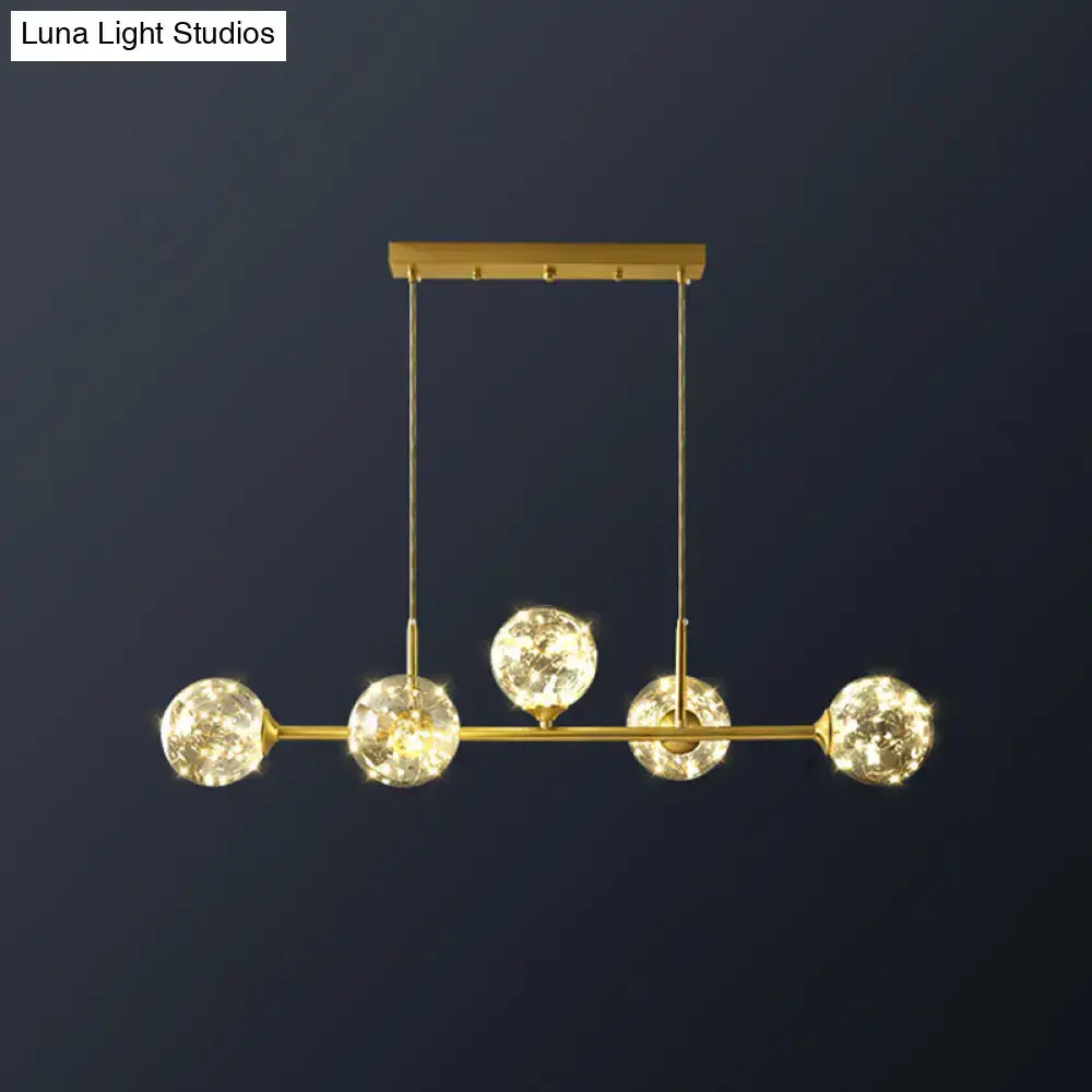 Minimalist brass led fairy light clear glass sphere dining room pendant