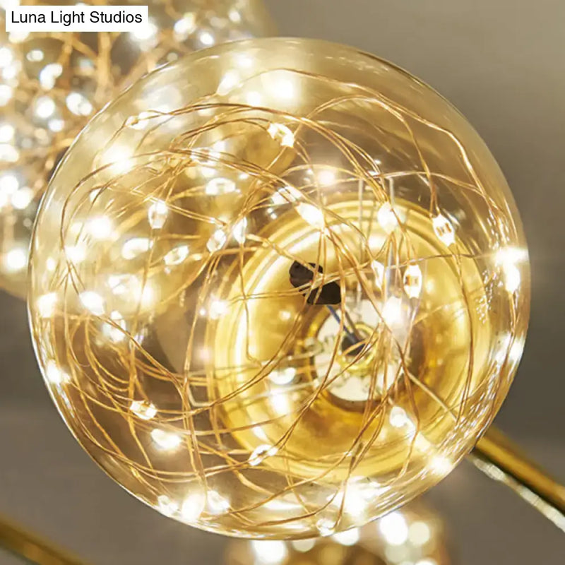 Minimalist brass led fairy light clear glass sphere dining room pendant