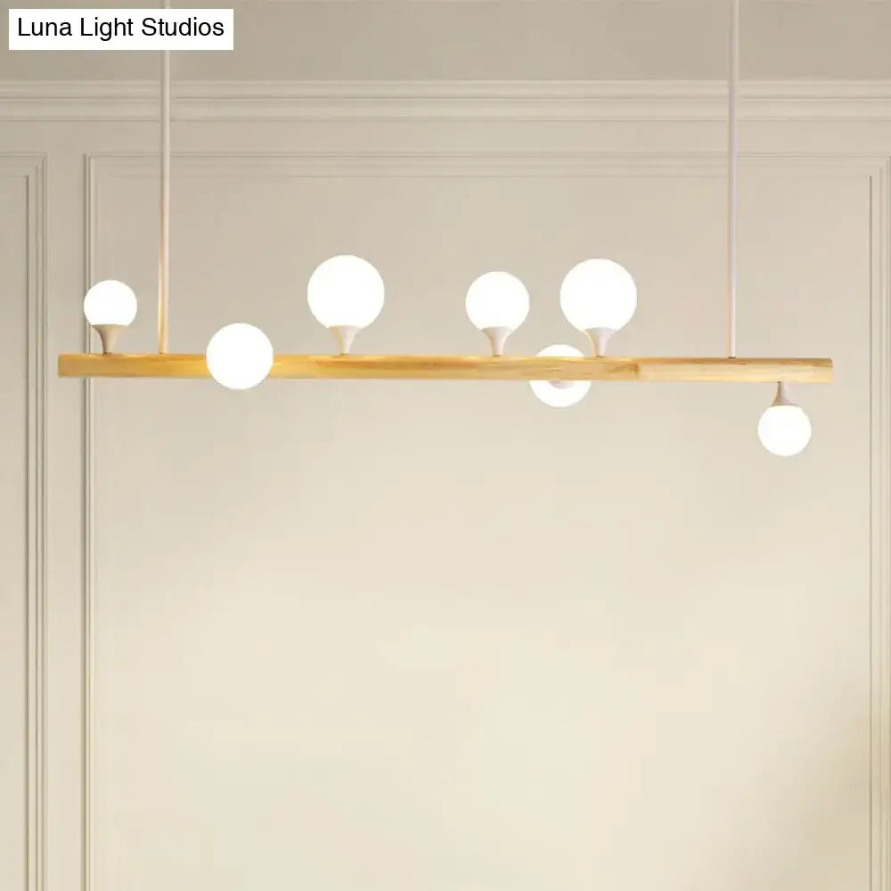Modern wood linear hanging island light – kitchen opal glass globes