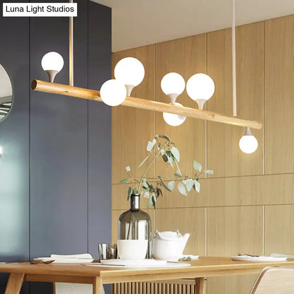 Modern wood linear hanging island light – kitchen opal glass globes