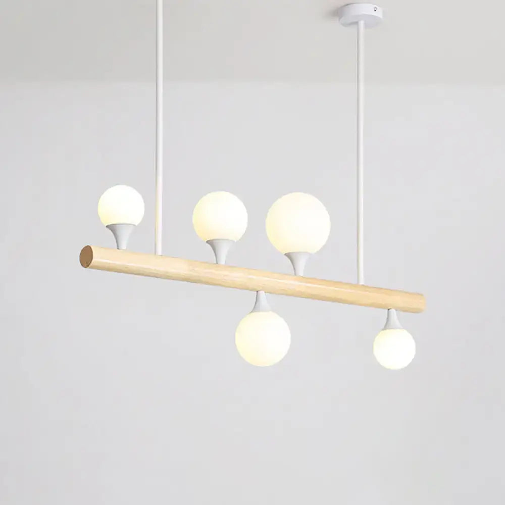 Modern wood linear hanging island light – kitchen opal glass globes