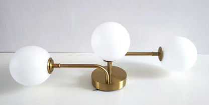 Modern brass ball ceiling light for living room with frosted glass