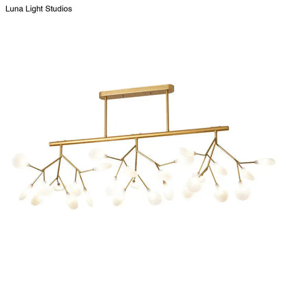 Modern gold firefly island pendant – dining room glass globe light