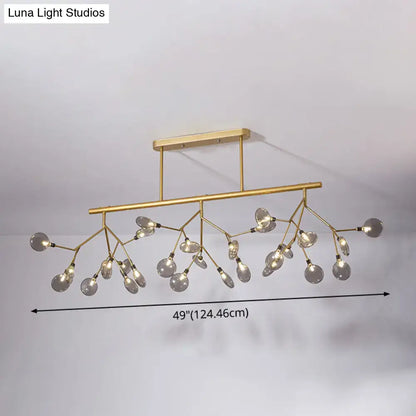 Modern gold firefly island pendant – dining room glass globe light