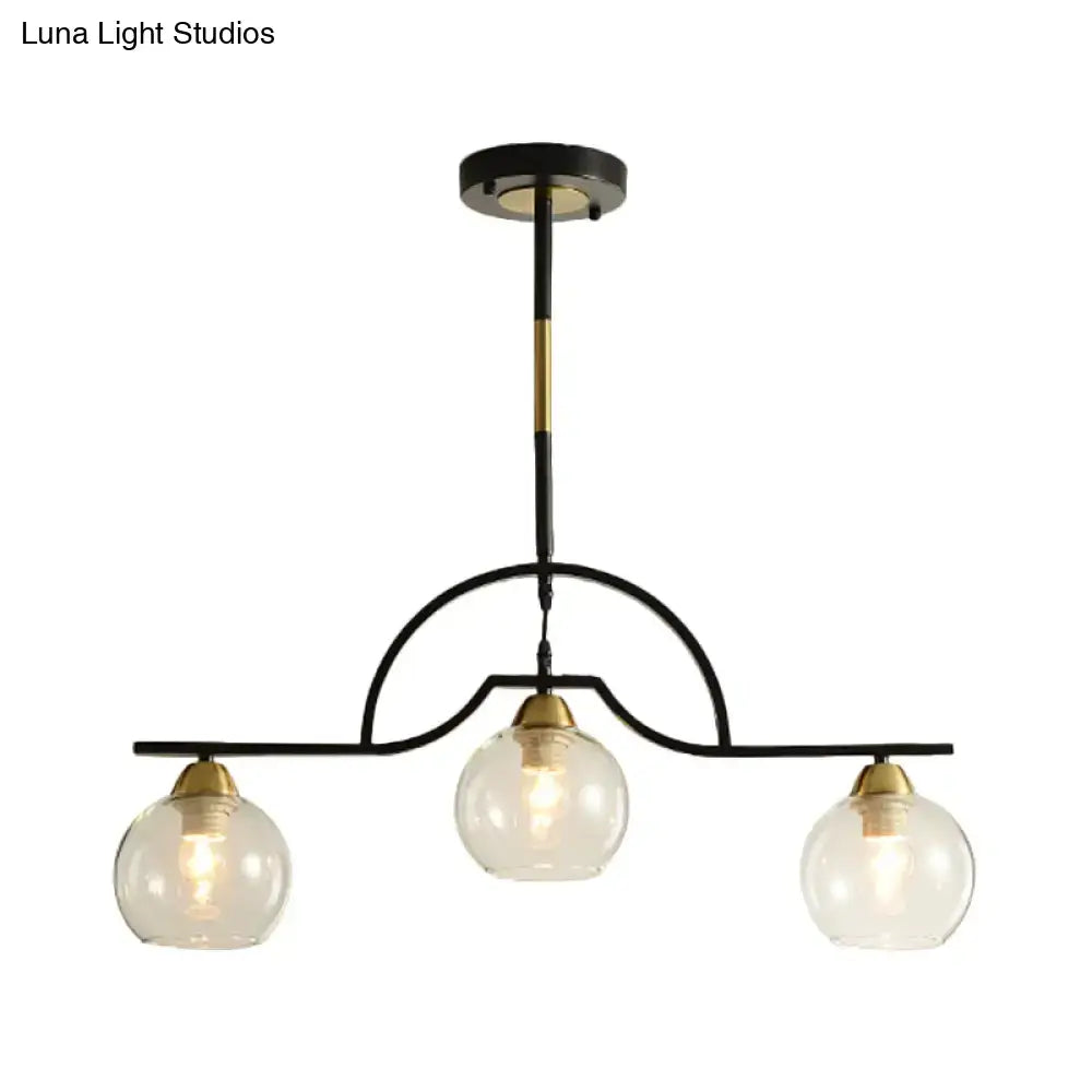 Modern black & brass arched pendant light with clear white glass kitchen