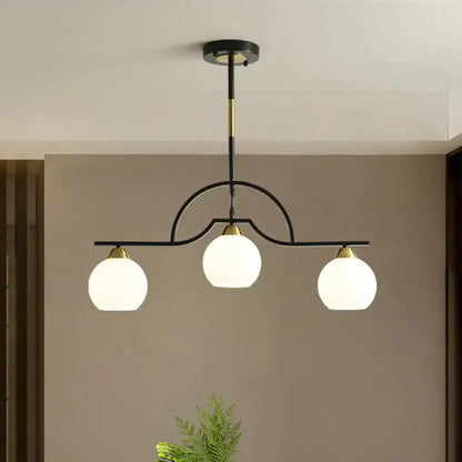 Modern black & brass arched pendant light with clear white glass kitchen