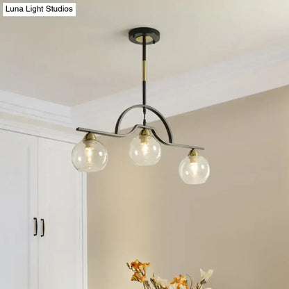 Modern black & brass arched pendant light with clear white glass kitchen
