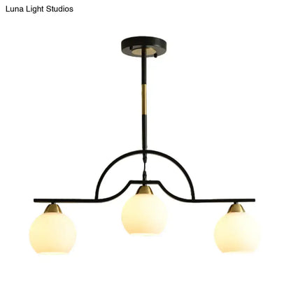 Modern black & brass arched pendant light with clear white glass kitchen
