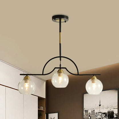 Modern black & brass arched pendant light with clear white glass kitchen