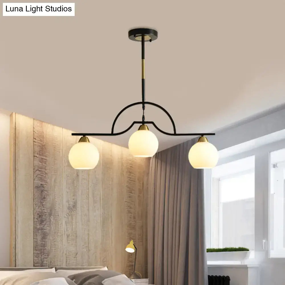 Modern black & brass arched pendant light with clear white glass kitchen