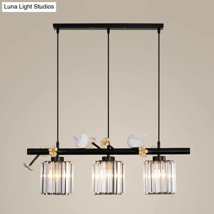 Modern black cylinder island light with birds – kitchen pendant