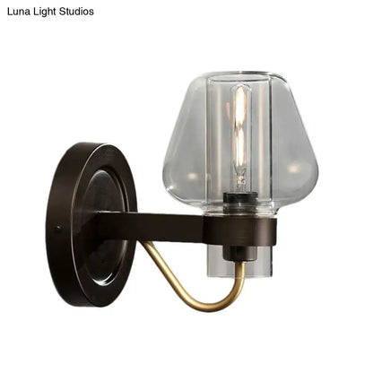 Modern black & brass wall sconce with glass mushroom shade bedroom