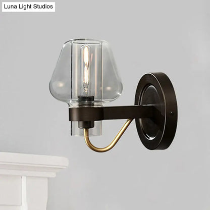 Modern black & brass wall sconce with glass mushroom shade bedroom