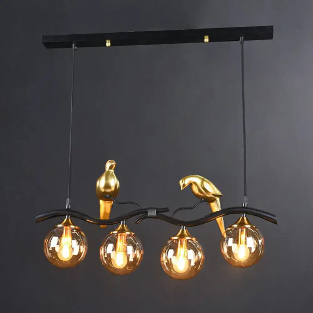 Modern bird branch island pendant light – dining room amber glass