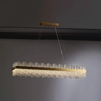 Modern brass plated crystal loop pendant light for dining room