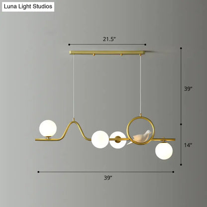 Modern gold curve island ceiling light with bird for dining room