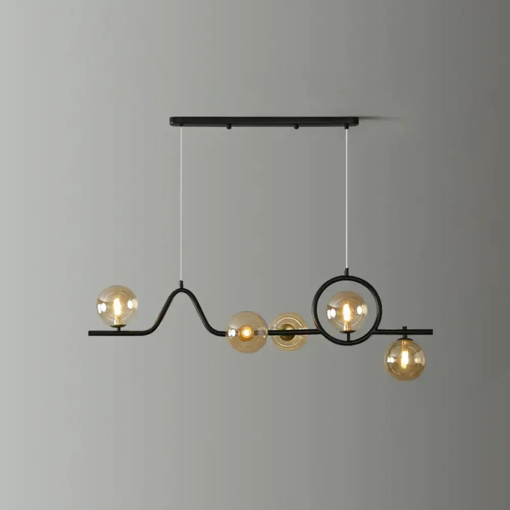 Modern gold curve island ceiling light with bird for dining room