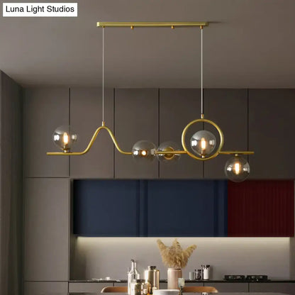 Modern gold curve island ceiling light with bird for dining room