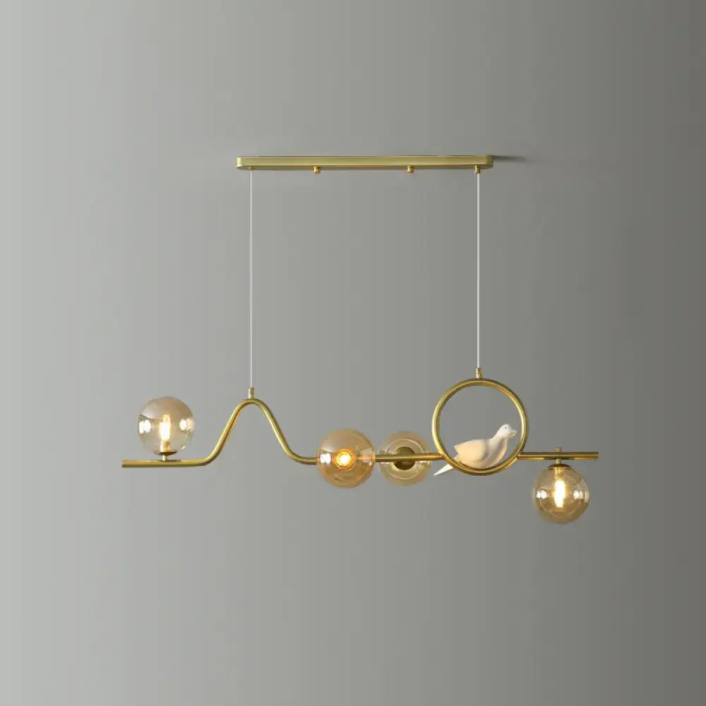 Modern gold curve island ceiling light with bird for dining room