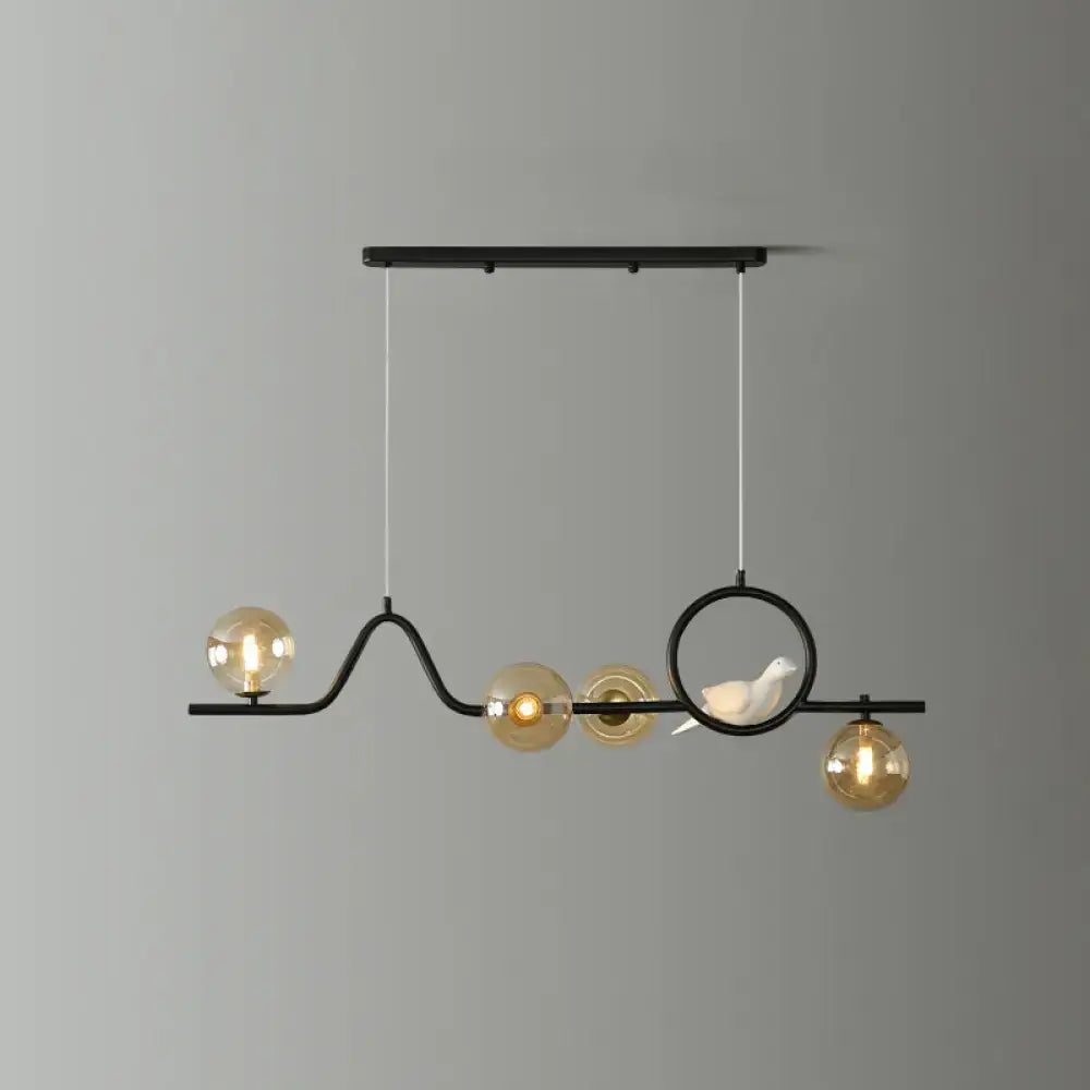 Modern gold curve island ceiling light with bird for dining room