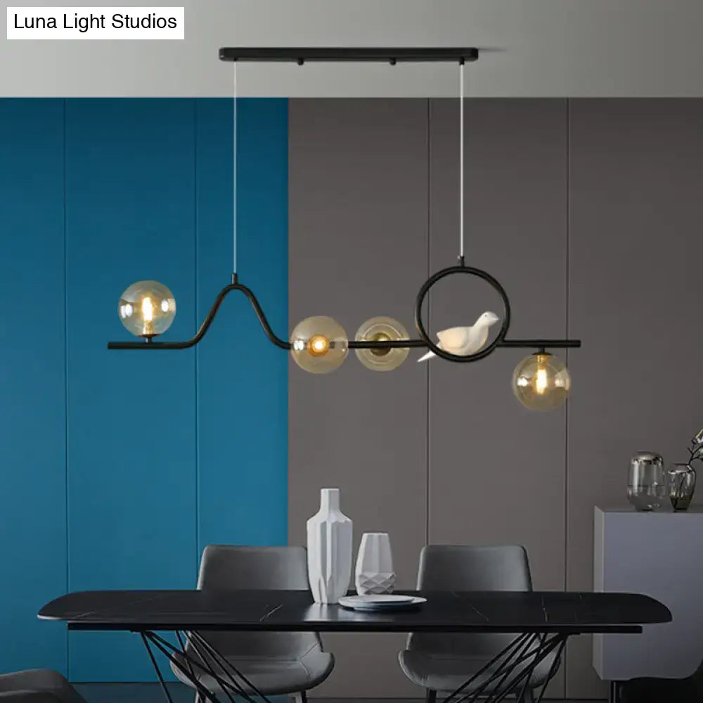 Modern gold curve island ceiling light with bird for dining room