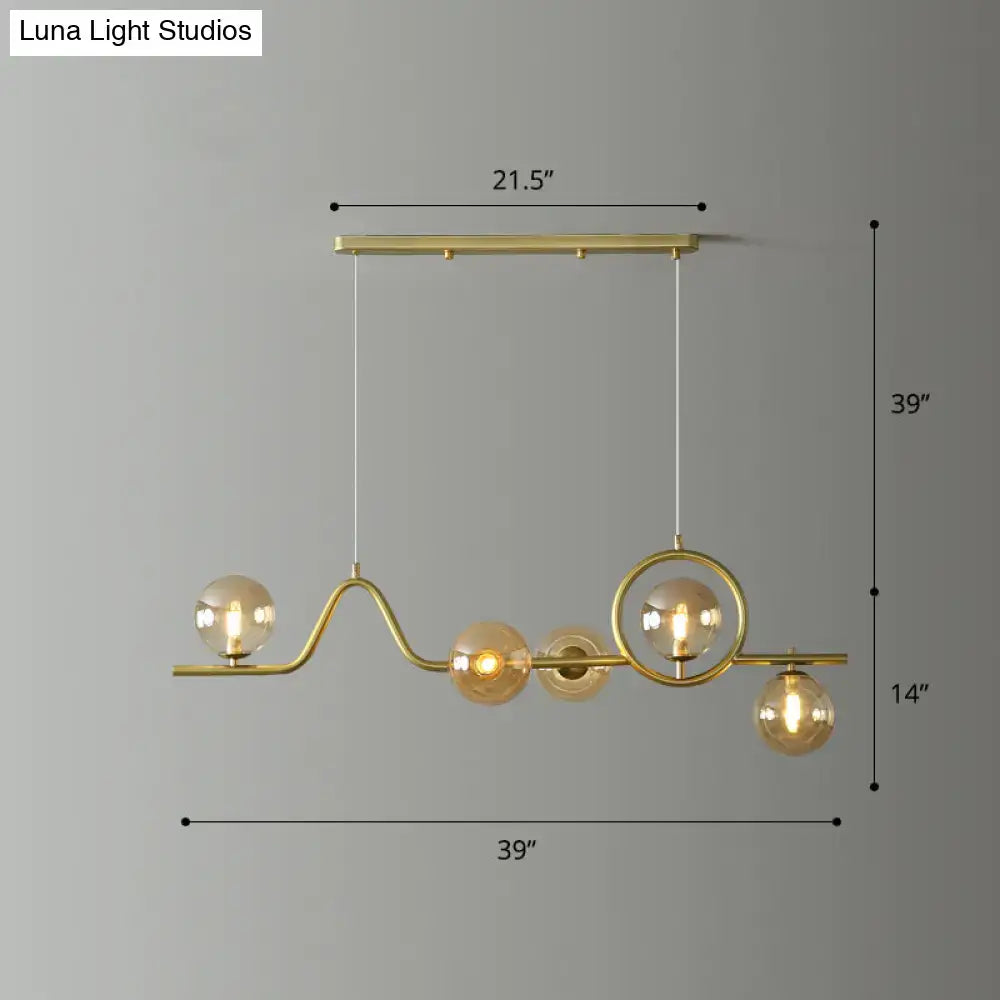Modern gold curve island ceiling light with bird for dining room