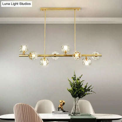 Modern gold pendant light with crystal dome shade – kitchen island
