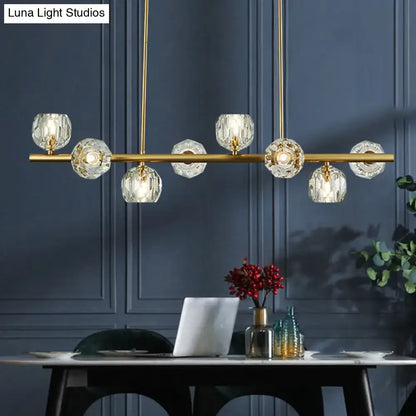Modern gold pendant light with crystal dome shade – kitchen island