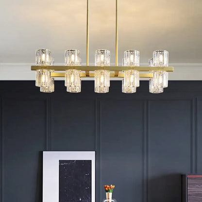 Modern golden cylindrical crystal pendant light for dining room