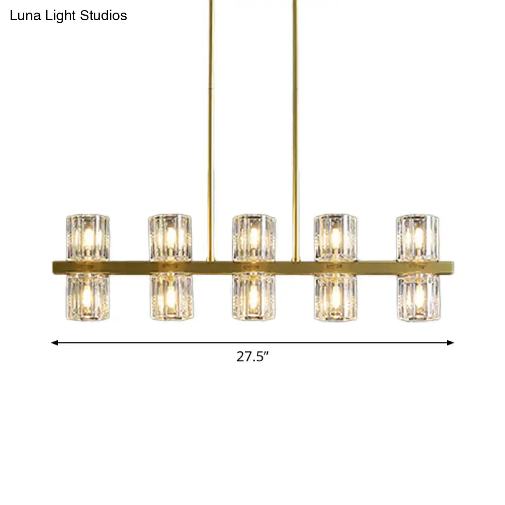 Modern golden cylindrical crystal pendant light for dining room