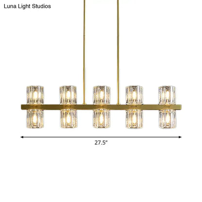 Modern golden cylindrical crystal pendant light for dining room