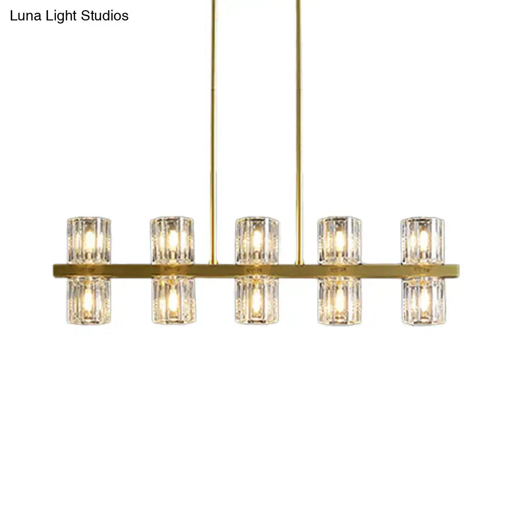 Modern golden cylindrical crystal pendant light for dining room