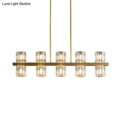 Modern golden cylindrical crystal pendant light for dining room