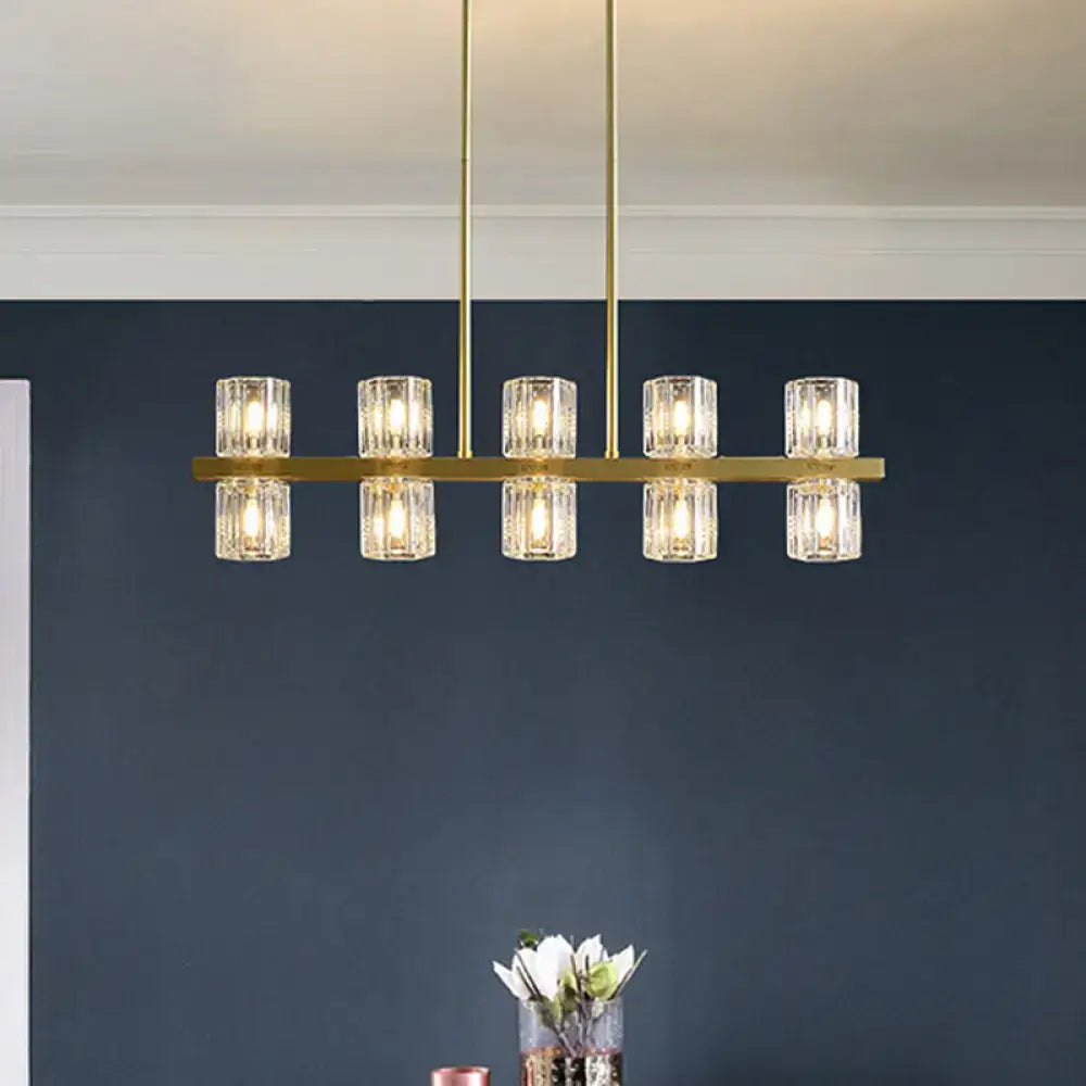 Modern golden cylindrical crystal pendant light for dining room