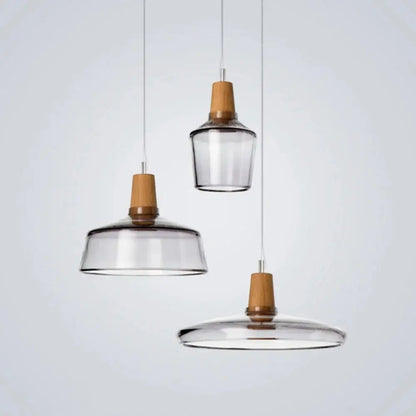 Modern glass light fixtures with wood accents – kitchen pendant set