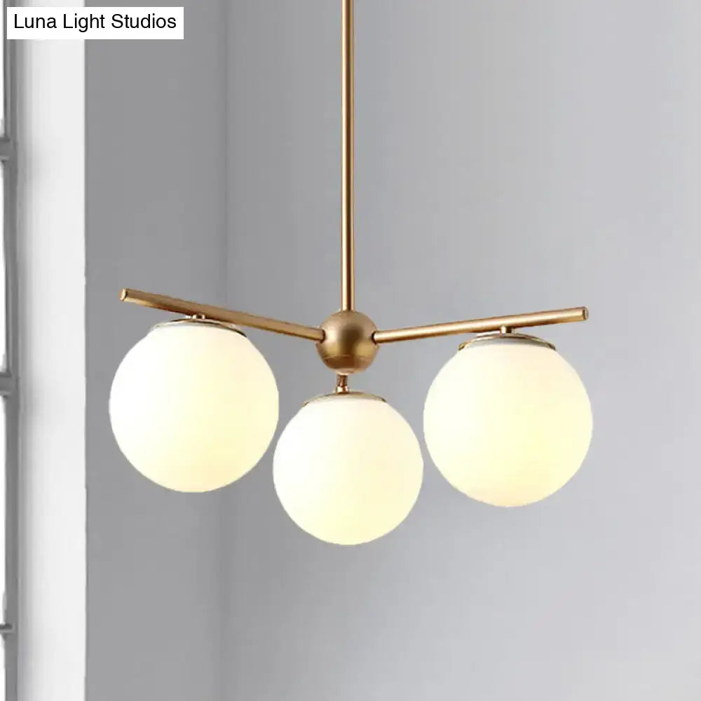 Modern gold 3-light white frosted glass globe chandelier bedroom